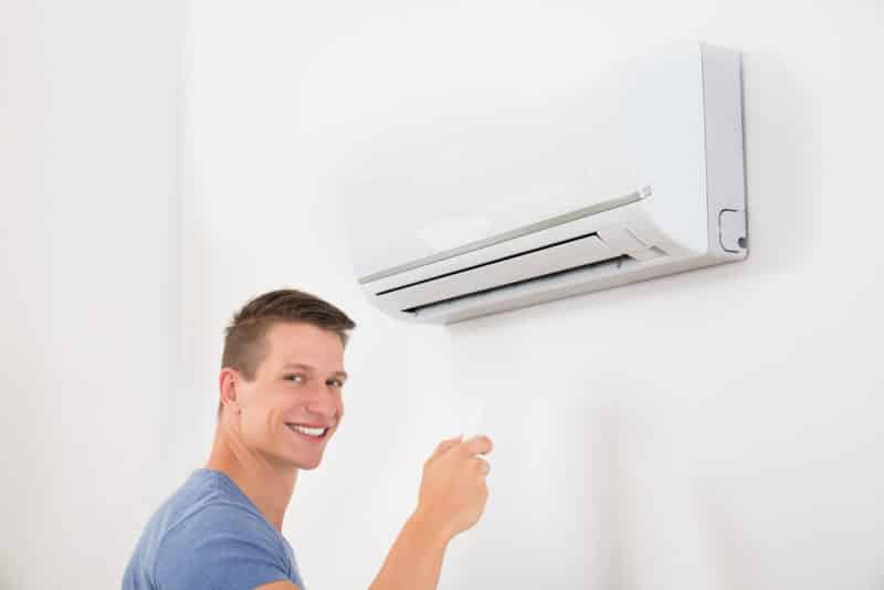 Comfort Man Controlling Ductless Istock 518458012 E1562689762817